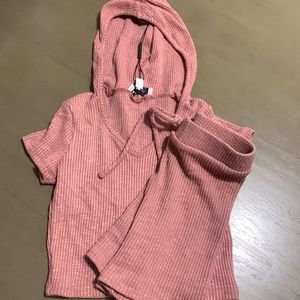 Two piece fashion nova set. Like New. Bottoms worn once, Top is brand new